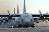 C-130 Hercules aircraft taxiing for mission poster print