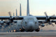 C-130 Hercules aircraft taxiing for mission poster print