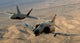 F-4 Phantom and F-22A Raptor flying in formation poster print by Stocktrek Images.