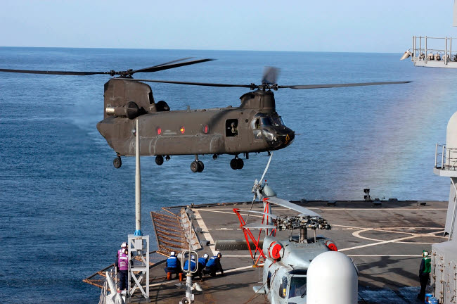 Army CH-47 Chinook helicopter landing on USS Blue Ridge poster print.