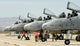 Maintainers performing pre-flight inspections on A-10 Thunderbolt II poster print.