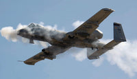 A-10 Thunderbolt II military aircraft poster print featuring dynamic action shot