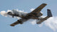 A-10 Thunderbolt II military aircraft poster print featuring dynamic action shot