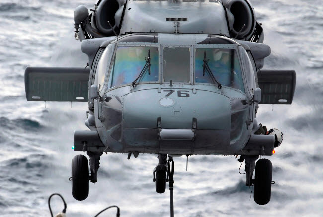 MH-60S Seahawk Helicopter Descending on USNS Rainer Poster Print