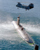 CH-46 Sea Knight Hovering Above an Attack Submarine Poster Print