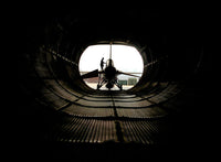 Technician Prepares an F-16 Fighting Falcon Poster Print by Stocktrek Images