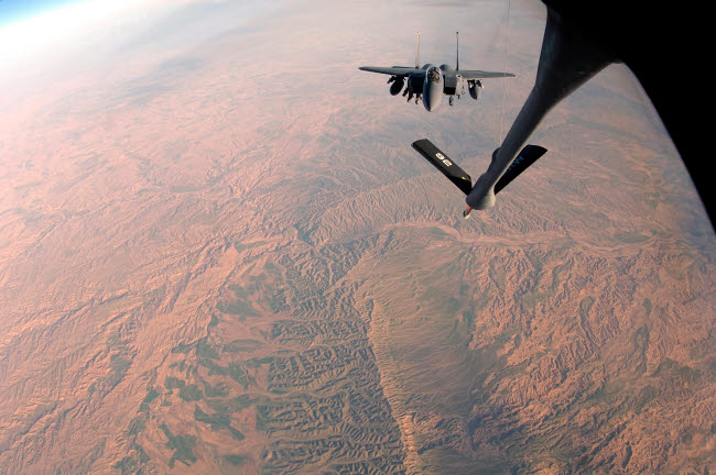F-15E Strike Eagle being refueled by KC-135 Stratotanker poster print.