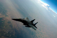 F-15E Strike Eagle breaking away from KC-135 Stratotanker during refueling.