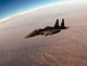 F-15E Strike Eagle breaking away from KC-135 Stratotanker poster print.