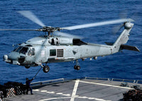 SH-60B Seahawk Helicopter performing vertical replenishment poster print.