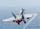 F/A-18 Hornet Taking Off Poster Print by Stocktrek Images