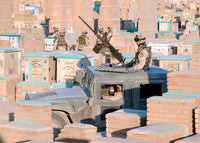 A soldier operating a M2 .50 caliber machine gun on a Humvee, military poster print.
