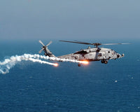 U.S. Navy HH-60H Seahawk Helicopter Poster Print dispensing flares and chaff.