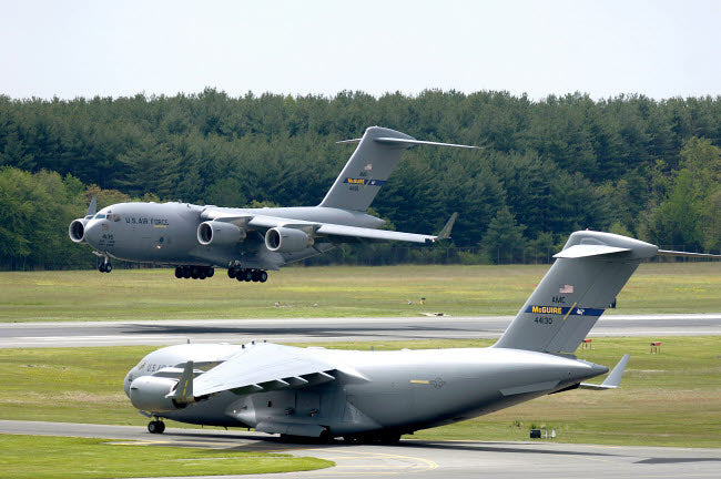C-17 Globemaster III performing touch and go landings poster print.
