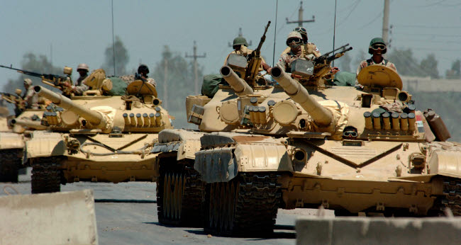 Iraqi tanks driving through a checkpoint poster print