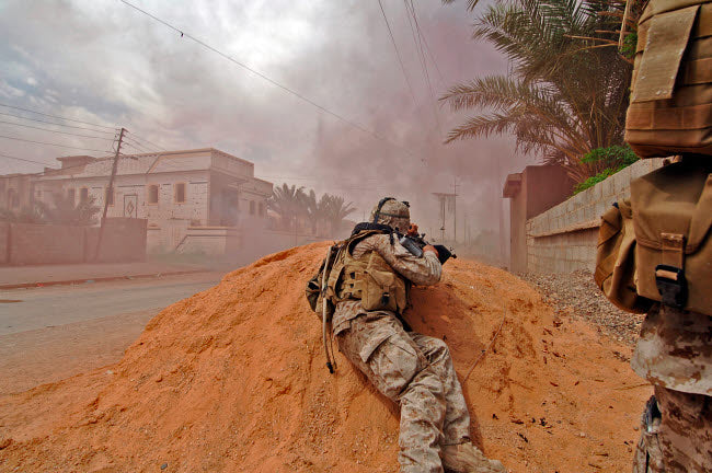 Soldier in Action Poster Print by Stocktrek Images, a powerful military-themed artwork.