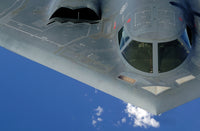 B-2 Spirit soaring over the Pacific Ocean poster print