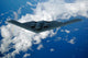 B-2 Spirit Bomber Poster Print by Stocktrek Images, showcasing the stealth aircraft in flight.