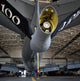 Airman hand-washing the underbelly of a KC-135 Stratotanker poster print.