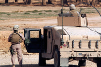Marines on Desert Patrol Poster Print by Stocktrek Images