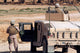 Marines on Desert Patrol Poster Print by Stocktrek Images