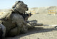 Marine fires M16A2 service rifle at Camp Baharia, Iraq