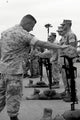 Soldier Pays Tribute to Fallen Marines Poster Print by Stocktrek Images