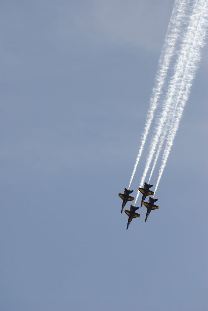 The Blue Angels performing aerial demonstrations during an air show poster print.