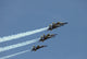 Blue Angels performing aerial demonstrations in an air show poster print.
