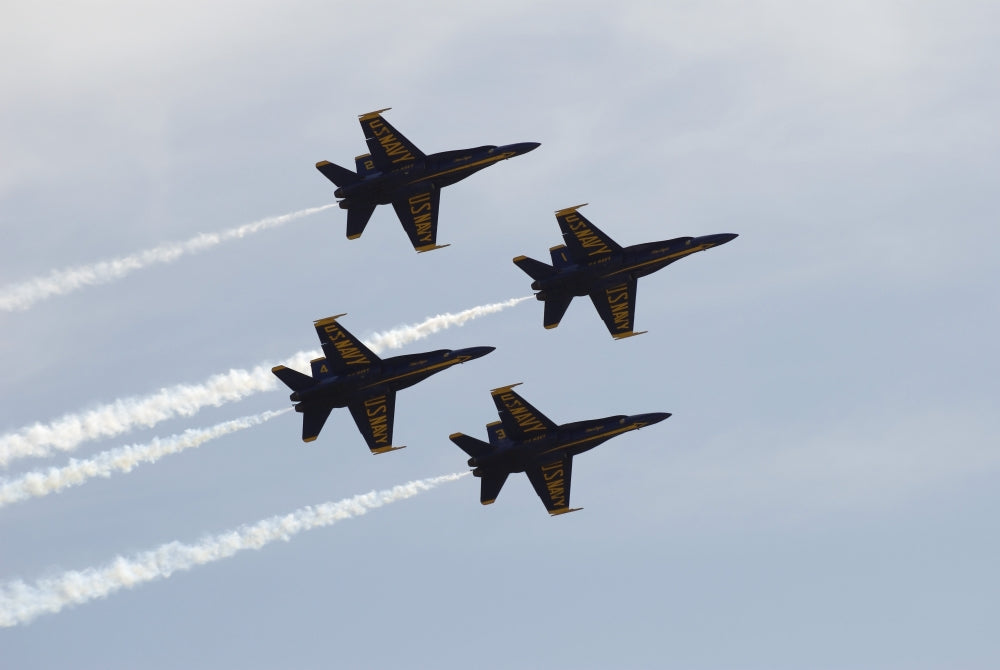 The Blue Angels performing aerial demonstrations at an air show poster print.