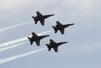 The Blue Angels performing aerial demonstrations at an air show poster print.
