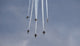 The Blue Angels performing aerial demonstrations in a vibrant poster print.