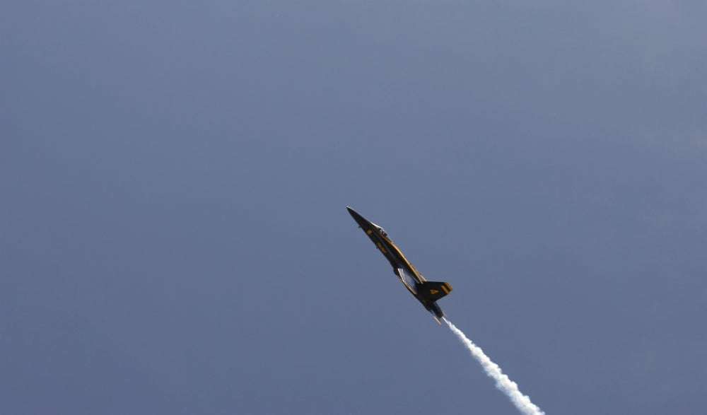 The Blue Angels performing aerial demonstrations during an air show poster print.