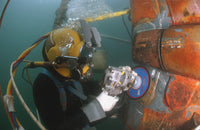 U.S. Navy Diver repairing USS Ogden at Naval Base San Diego Poster Print