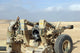 U.S. Marines firing howitzer near Baghdad, Iraq - January 6, 2007 Poster Print