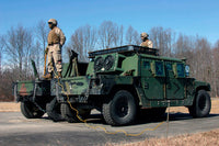 CH-53 Sea Stallion military poster print showcasing a soldier hooking Humvees.