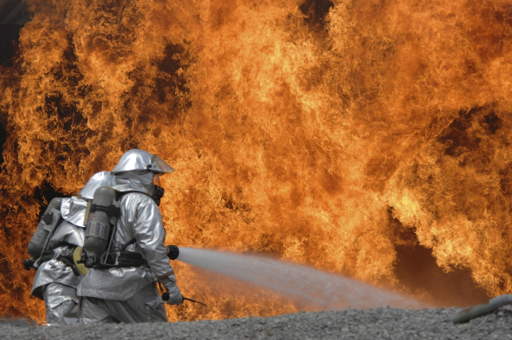Firemen neutralizing a fire during a training exercise at Shaw Air Force Base.
