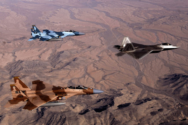 F-15 Aggressor Eagles and F-22 Raptor flying in formation poster print.