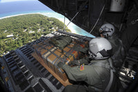 C-130 Hercules Poster Print showing airmen delivering goods over Yap.