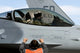 Round personnel prepares to taxi an F-16 Fighting Falcon Poster Print