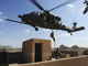 U.S. Air Force Pararescuemen fast roping from HH-60 Pave Hawk helicopter poster print.