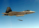 F-22A Raptor drops GBU-32 bomb poster print by Stocktrek Images.