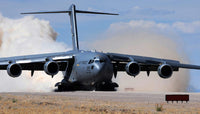 C-17 Globemaster landing on the runway poster print by Stocktrek Images.