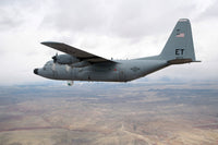 C-130 Hercules soaring through the sky poster print