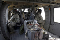 U.S. Army Flight Support Poster Print showing soldiers monitoring air support during training.