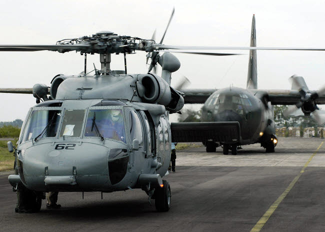 US Navy SH-60B Seahawk helicopter and Australian C-130 Hercules poster print.