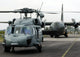 US Navy SH-60B Seahawk helicopter and Australian C-130 Hercules poster print.