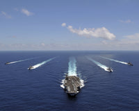 USS Abraham Lincoln Aircraft Carrier Poster Print showcasing naval strength in the Indian Ocean.