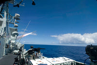 HMCS Regina firing a Harpoon anti-ship missile during a Rim of the Pacific exercise.