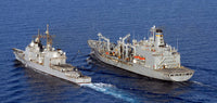 USS Gettysburg conducting an underway replenishment with USNS Walter S Diehl Poster Print